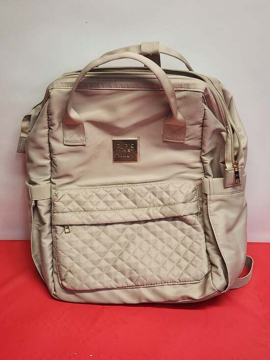 Paris Hilton Handbags - Paris Hilton Quilted Laptop Backpack in Beige